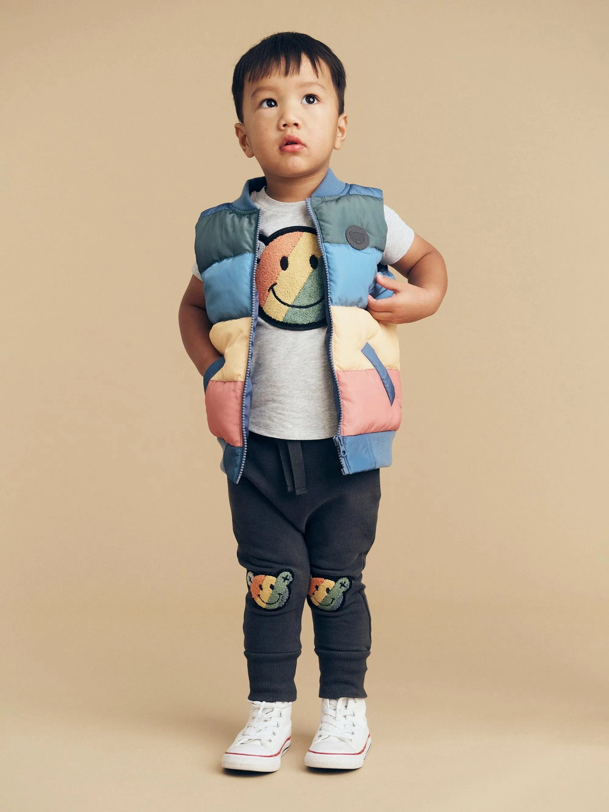 Smiley rainbow puffer boy vest